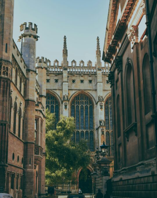 Church framed by street.